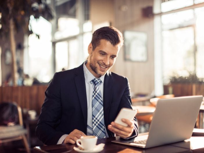 Accountant smiling because of new leads coming in through SEO