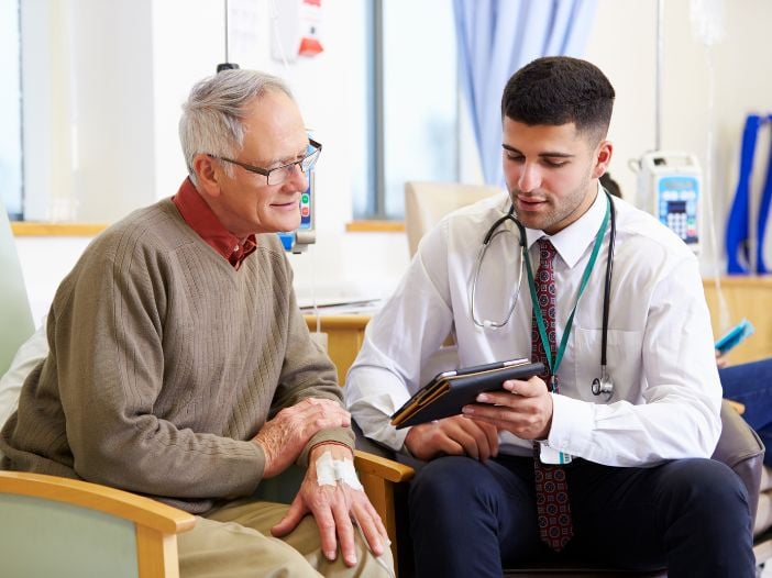 Young doctor discussing treatment with patient