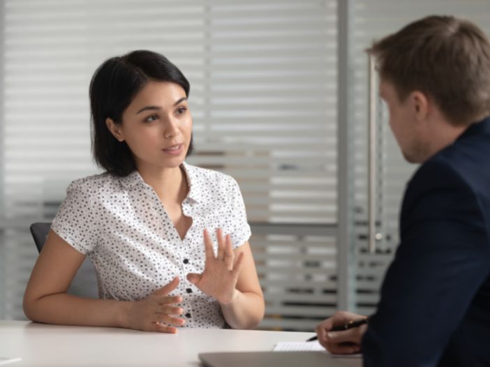 lady with bank manager applying for a home loan